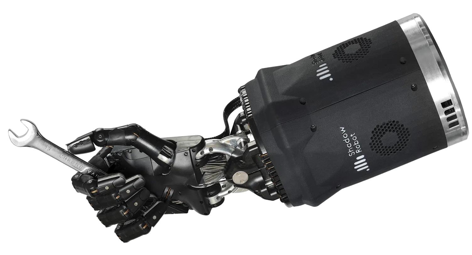 The Shadow Dexterous Hand and its large motor-filled forearm holding a spanner